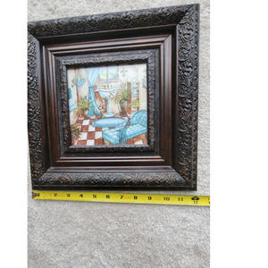 Two blue and brown bathroom pictures